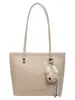 Estilo minimalista, bolso tote de mujer elegante y moderno, nuevo modelo 2026, bolso de hombro moderno y versátil para el trabajo y los desplazamientos