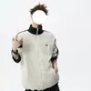 Sudadera cárdigan de punto texturizado con rayas verticales de patchwork bicolor para hombre, chaqueta deportiva casual de primavera texturizada de alta resistencia con cuello alto y corte holgado