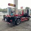 Fabricante de Camión de Basura Removible para Compartimento de Chasis Pesado Sinotruk Haoman Marca Azul Transportador de Residuos de Construcción
