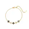Collar Cruzado Versátil de Nácar Trébol de Cuatro Hojas Acero de Titanio Joyería de Lujo Ligero Alto Gama Diseño de Moda Accesorio de Cadena para Clavícula