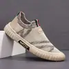 Nuevos zapatos de lona para hombre 2026 primavera-verano zapatos con panel de malla transpirables versátiles zapatos para hombre estilo coreano modernos mocasines slip-on