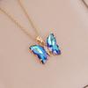 Collar con colgante de mariposa con gradiente transfronterizo para mujer, cadena de clavícula con personalidad, accesorios al por mayor, Europa y Estados Unidos