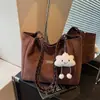 Bolsa Grande de Camurça Vintage 2026 Novo Modelo Casual para o Dia a Dia Feminina de Ombro Bolsa Tote para o Escritório