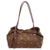 Bolso de hombro de gran capacidad con estampado de lunares texturizado estilo occidental, nuevo modelo de moda otoño 2026, simple, versátil, de alto valor