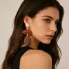 Pendientes transfronterizos de color marrón caramelo intenso con detalles de resina, pendientes de botón exagerados de estilo Maillard marrón vintage, de nicho europeo y americano, para mujer