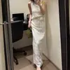 Conjunto de Chaleco de Punto Hueco de Diseño Estilo Coreano Nuevo Verano 2026 Vestido Largo de Dos Piezas Puro Deseo Nicho