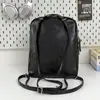 Nueva mochila escolar moderna y genial transfronteriza estilo retro europeo y americano mochila de PU para hombres y mujeres mismo estilo mochila casual de gran capacidad