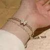 Pulsera de Borla de Cuentas Mariposa para Mujer 2026 Nuevo Estilo Pulsera Abierta Lujo Ligero Pulsera de Nicho Pulsera de Doble Capa de Gama Alta