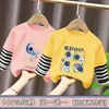 Camiseta de manga larga de algodón puro para niño, nuevo modelo primavera y otoño 2026, camiseta básica con estampado de dibujos animados para niño, top falso de dos piezas, moderno