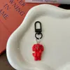 Chaveiro de Cachorro Maligno Vermelho Excêntrico Pingente de Animal Fofo de Desenho Animado Ornamento Doce para Mochila