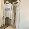 Conjunto Esportivo Casual para Mulheres, Simples 2026 Primavera e Outono Nova Moda Estampado Blusão Solto e Calça Longa Conjunto de Duas Peças