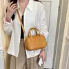 Bolso de bolos con patrón tejido único para mujer, nuevo bolso de mano vintage 2026, bolso versátil para el hombro y cruzado para el día a día