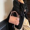 Bolsa de mão tipo balde com sensação de luxo, nova moda primavera 2025, bolsa de ombro simples e versátil, tendência, bolsa carteiro casual