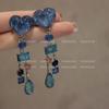 Pendientes largos de alta gama con borlas de cristal de amor y ondas de agua azul con diseño de nicho marino y cuna de hielo