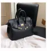 Estilo explosivo de moda transfronteiriça bolsa grande de mão feminina 2026 nova bolsa vermelha de casamento da moda bolsa tote transversal de grande capacidade