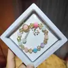 Libro Caperucita Roja Mismo Estilo Estudiante Pulsera de Glaseado de Palomitas de Maíz Hecha a Mano con Cuentas Dibujos Animados Cristal Pulsera Infantil Venta al por Mayor Cajas de Regalo