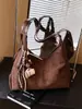 Bolsa Feminina de Axila Alto Padrão Luxo Leve Nicho Versátil para o Dia a Dia Outono/Inverno Estilo Retro Melanístico Bolsa Tote de Ombro Único
