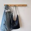 Bolso tipo cubo casual de moda estilo coreano 2026, textura de nicho, versátil para llevar al hombro y cruzado, bolso de mano de gran capacidad