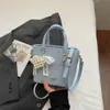 Bolso Cubo Estilo Coreano Yuezi Casual y de Moda 2026 Primavera Nuevo de Moda Nicho Moda Bolso de Hombro Cruzado para Mujer