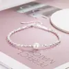 Tornozeleira de Pérolas Prateadas Quebradas para Mulheres, Estilo de Alto Padrão, Novo Modelo Tendência 2023, Luxo Leve, Design Simples e Único Joia para Pé