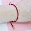 Pareja japonesa y coreana hebilla de acero de titanio ajustable cuerda de mano multicolor resistente al desgaste pulsera tejida fabricantes venta al por mayor colgante DIY