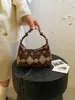 Bolso de Mano Retro de Gama Alta para Mujer Otoño 2026 Nuevo Bolso de Hombro Cruzado de Gran Capacidad Bolso de Axila de Nicho Bolso para Teléfono