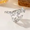 Anillo de mariposa vintage europeo y americano para mujer, blanco plateado, multi-hilo, ala de mariposa, circón con forma de pera, accesorio ajustable, disponible para exportación y venta al por mayor