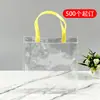 Suministro directo de fábrica bolsa de compras transparente de PVC bolso de mano de plástico impermeable bolsa de compras de PVC publicitaria engrosada con logo impreso