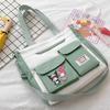 Bolso de hombro coolomi japonés bonito, tutorial de dibujos animados para estudiantes de secundaria y preparatoria, bolso de mensajero portátil de gran capacidad.