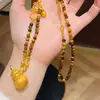 Collar Colgante de Calabaza con Bolsita de Piedra Ojo de Tigre Natural y Arena Dorada para Mujer, Cadena Larga para Suéter, Estilo de Lujo Ligero de Verano de Alta Gama