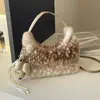 Bolso de mano de felpa versátil de gran capacidad, nuevo para el otoño de 2026, bolso de hombro y bolso cruzado de moda estilo coreano