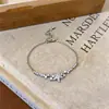 Pulsera Flor Gota de Agua de Zirconia Bañada en Oro Real de 18K, Pulsera de Diseño Exclusivo, Joyería Minimalista de Lujo Ligero al por Mayor