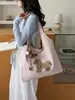 Bolso casual de tela de gran capacidad para mujer, nuevo diseño de moda de verano 2026, bolso de hombro simple, bolsa tote para uso diario