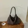 Bolso tote de estilo coreano 2026 transfronterizo, bolso de hombro de gran capacidad para el trabajo, bolso de mano versátil, bolso de moda para llevar bajo el brazo