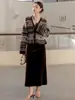 Falda de Terciopelo Lujosa y de Alta Gama para Mujer, Nuevo Estilo Invierno 2026, Versátil Retro Fluida Negra Línea A