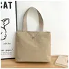 Bolso de Mujer Sencillo y de Moda al por Mayor Nylon Color Sólido Bolso Tote Portátil Bolso de Hombro para Mujeres Viajeras Mochila para Estudiantes