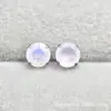 Aleación de titanio ASTM F-136 garra redonda con ópalo G23 titanio nuevo aretes de ópalo joyería para piercing corporal