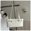 Bolso de hombro de nicho de alta gama para mujer 2025 nuevo de moda simple versátil bolso de axila para el trabajo bolso de mano pequeño