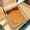 Pulsera de cuentas chapada en oro vietnamita, lujo ligero con un toque de alta gama, exquisita pulsera elástica de cuentas que no se decolora durante mucho tiempo, versátil y de nicho