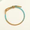 Productos semiacabados Pulsera semiacabada tejida a mano Qianli Jiangshan con espiral de flor de durazno ajustable para usar colgando