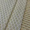 Tejido jacquard con relieve de pequeñas flores amarillas, textura cóncava-convexa tridimensional fresca, tejido para vestido de equipaje hecho a mano.