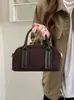 Bolso de bolos Yozhi de ante transfronterizo, bolso de mano retro casual de cuero genuino, diseño moderno, bolso de hombro elegante