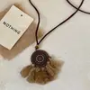 Novo Colar de Pena Antigo em Bronze Inspirado no Zen Estilo Chinês para Mulheres, Estilo Étnico Boêmio, Corrente Longa de Suéter Dupla Camada