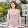 Novo top estilo chinês para mães com adornos de strass, botões de nó chinês tradicionais e decorações florais tridimensionais para mulheres de meia-idade e idosas