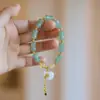 Nuevo Estilo Chino Pulsera Natural de Seda Dorada y Jade Tiandongling Jade Rústico Bolsa de Dinero Círculo Único Jade de Gobi de Alto Grado Cadena de Mano Cuentas de Buda