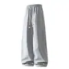 Pantalones de pierna curva estilo americano para hombre, nueva colección otoño 2026, con un diseño fluido de pierna recta, estilo pantalones cargo parachute, versátiles, de corte holgado, pierna ancha y casual