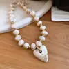 Collares bohemios de cuentas europeos y americanos para mujer, cadenas para la clavícula de diseño nicho, collares de lujo ligero de alta gama para mujer al por mayor