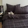 Conjunto de Roupa de Cama de Quatro Peças Xadrez Amigo do Bebê Modelo Novo 2026, Conjunto de Três Peças com Lençol de Cama e Capa de Edredom de Algodão Lavado Vintage