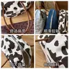 Fábrica de origen de Guangzhou bolso de mano con correa de cuero semi-redondo bolsa de almacenamiento con cremallera personalizada bolsa de maquillaje bolso tote de mezclilla para estudiante