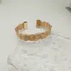 Pulseira Tecida Torcida Vintage de Moda Transfronteiriça para Mulheres Feita à Mão Larga Plana Pulseira com Abertura Distintiva